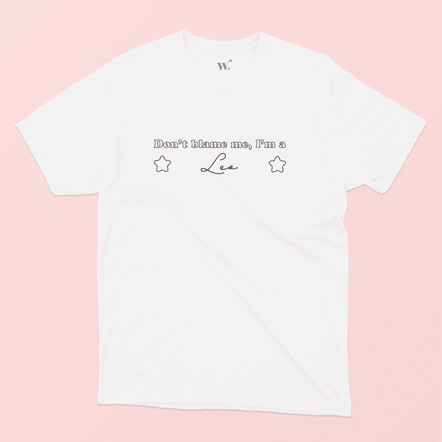 Don't blame me I'm a Leo illustrated white t-shirt on a pink background