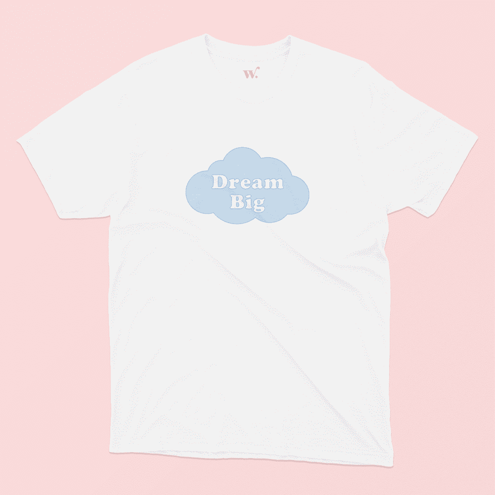 dream big illustrated white t-shirt on a pink background