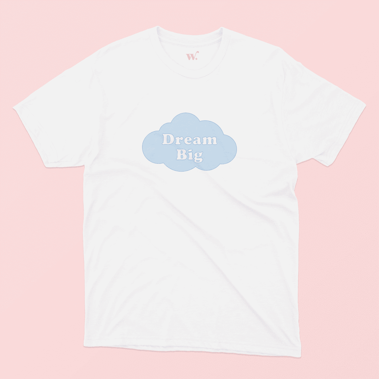 dream big illustrated white t-shirt on a pink background
