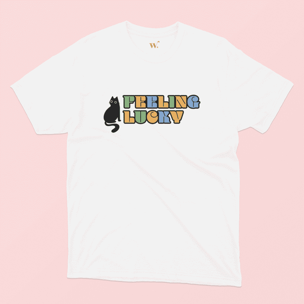 Feeling Lucky Illustrated White t-shirt on a Pink background