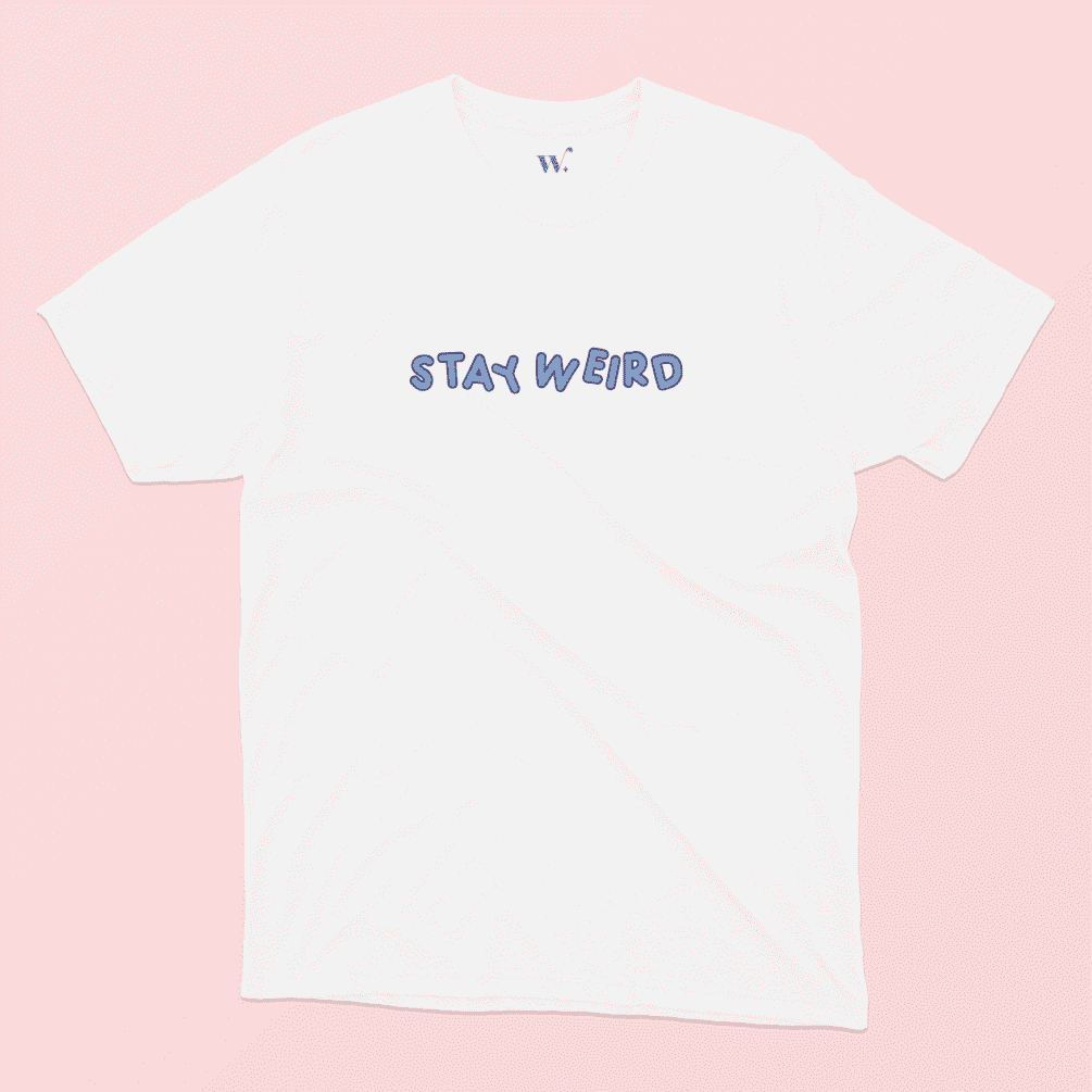 Stay Weird in Blue Illustrated T-Shirt in White on a Pink background