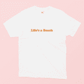 Life's a Beach Illustrated T-Shirt in White on a Pink Background