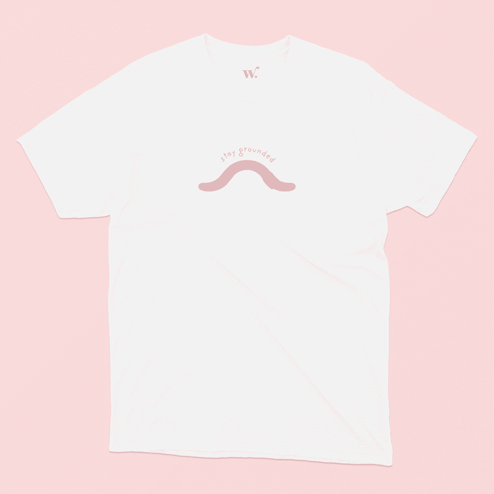 stay grounded illustrated t-shirt in White on a Pink Background